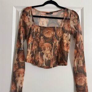Angel print mesh top